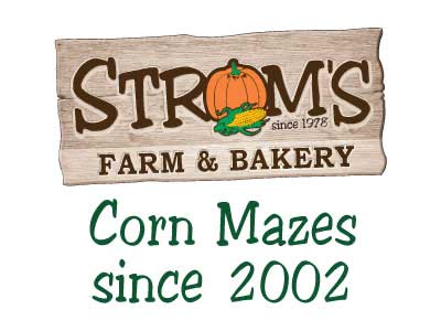 A sign of Strom's Corn Mazes Since 2002.